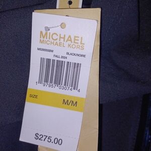 Michael korrs jacket price tag still on it